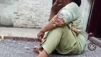 Sultry Desi Aunty Puffing On A Cigarette